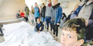 গাজায় লাশের মিছিল, রক্তে ভিজে আছে লাশ বহনকারী ব্যাগ বা কাফনের কাপড়